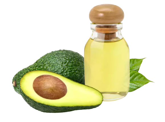 Avocado oil in a small jar next to sliced avocados